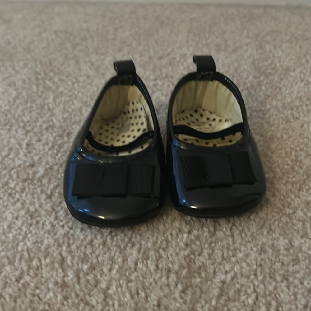 Carter’s black baby shoes size 1 like new great condition.